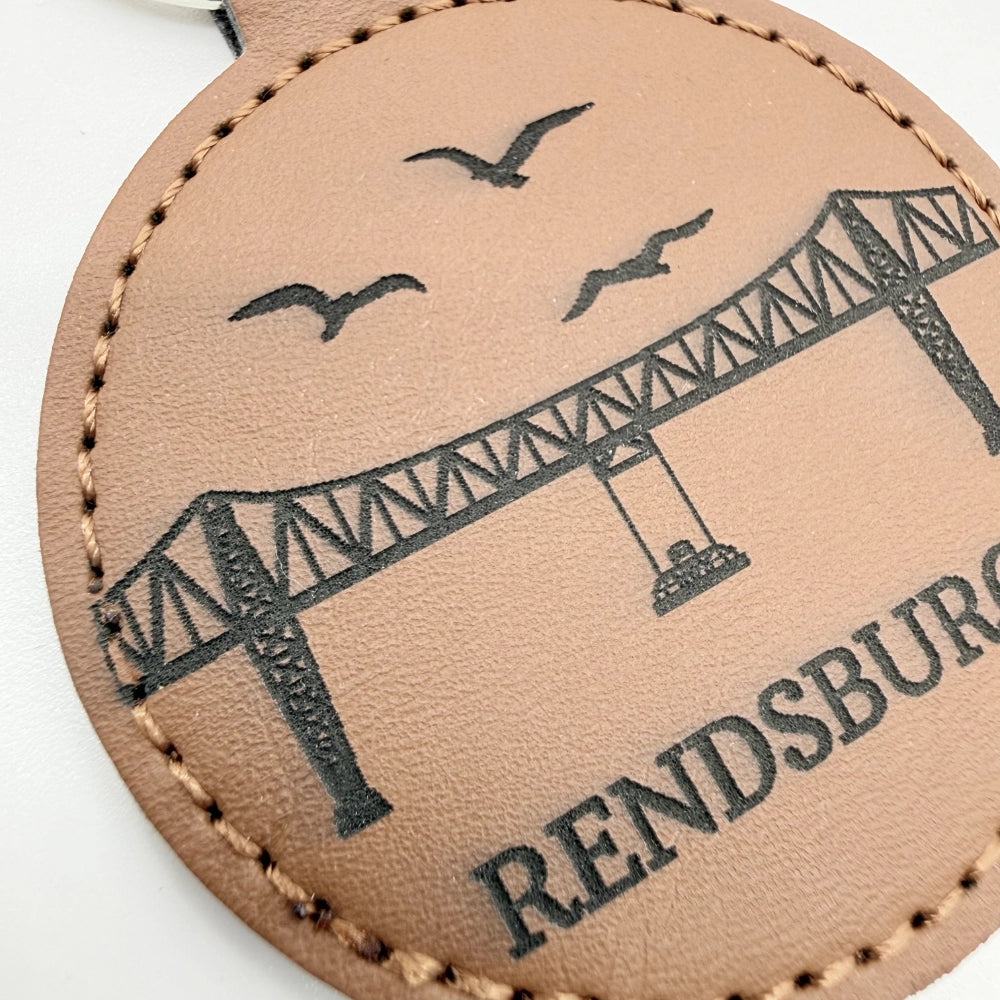 Runder Schlüsselanhänger mit Fach für Chip "Hochbrücke Rendsburg"